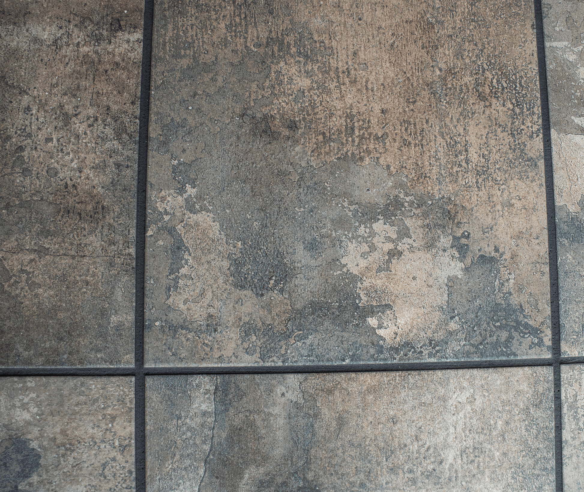 Dominus Heat Corner Hearth Pad in Navajo Nero